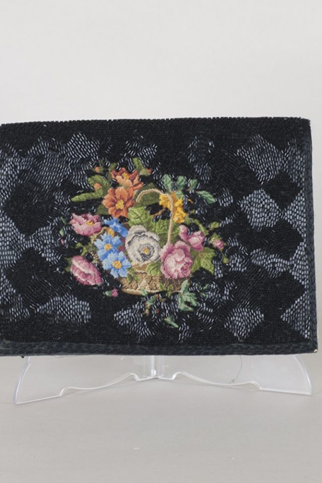 Petit point and paillette black clutch